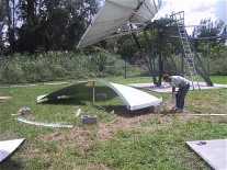 Assembling the antenna dish reflector panels requires great skill.  The outer ring must be flat to 3mm for C band operation