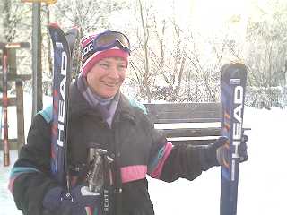 Chris at the bus stop in Kaprun centre by the river