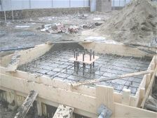 Concrete satellite antenna base for 3.8m dish, with reinforcing iron rods shown prior to final concrete pouring