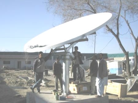 Large VSAT antenna under construction.  The feed arm and support struts are not yet attached