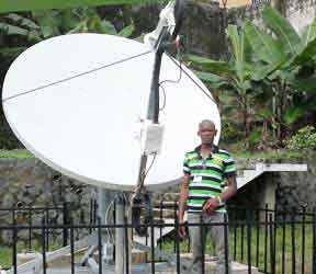 2.4m C band VSAT dish installation, circular polarisation, using a 10 watts Terrasat AC 
      externally powered BUC