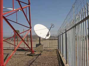 Antenna next to wireless tower
