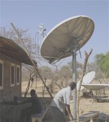 VSAT installer at work in Kenya, Africa