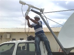 VSAT installer connecting up the C band LNB