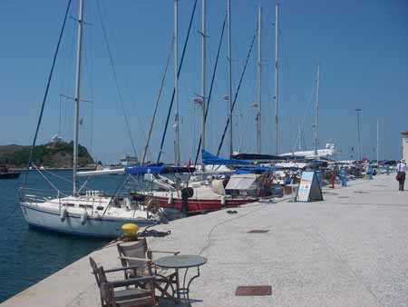 Myrina harbour with cruise ship in distance.
