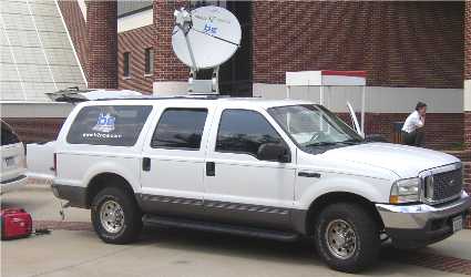 Motosat motorized VSAT dish on vehicle roof