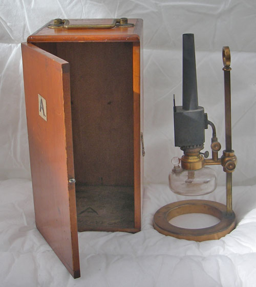 Antique microscope oil lamp with wooden case