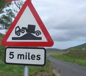Sign at Glengarden warning of abnormal humped bridge on the A939 road at Rinloan.