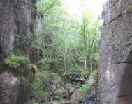 Inside the Burn o'Vat, a large cavity, carved out of the rock by whirling boulders.